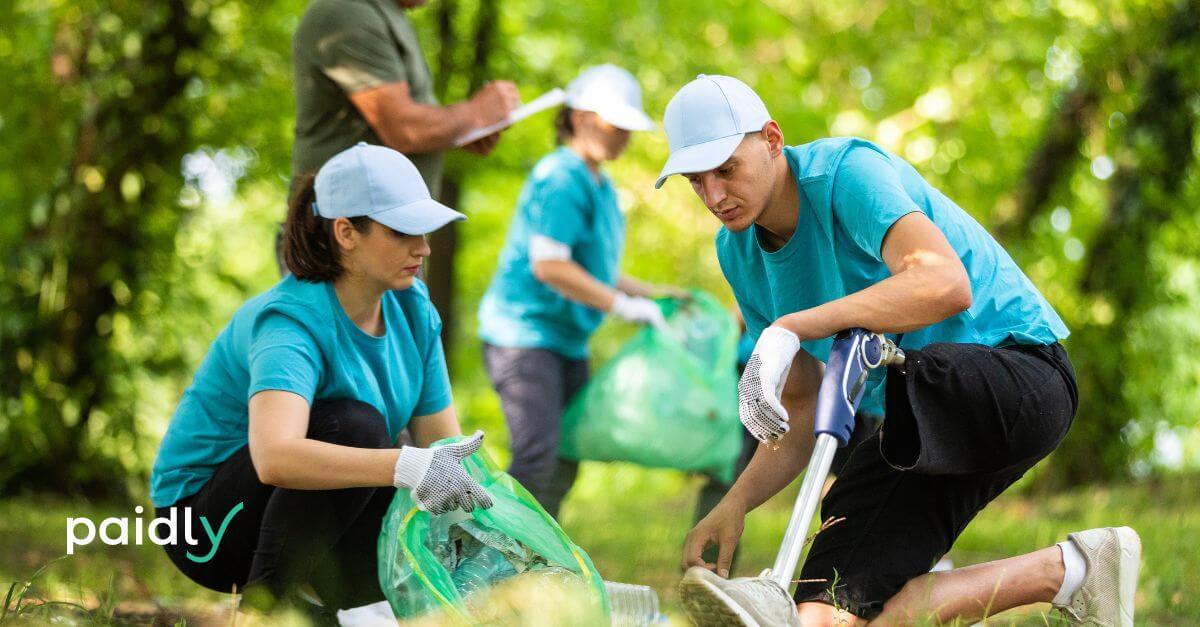 nonprofit workers picking up litter