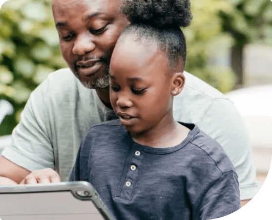 Father and Daughter Using Tablet