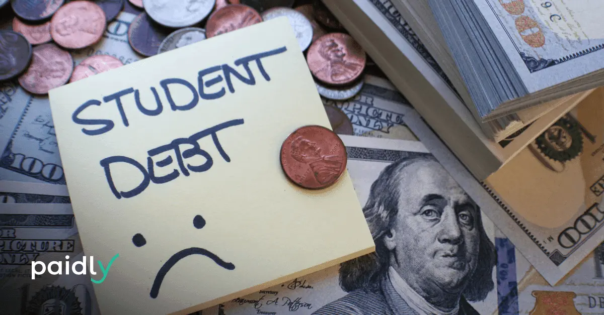 Student Loan Changes Under OBBBA Explained Sticky notes with the words "Student Debt" and a frowning face written in marker, laying on top of a pile of money, with the Paidly logo